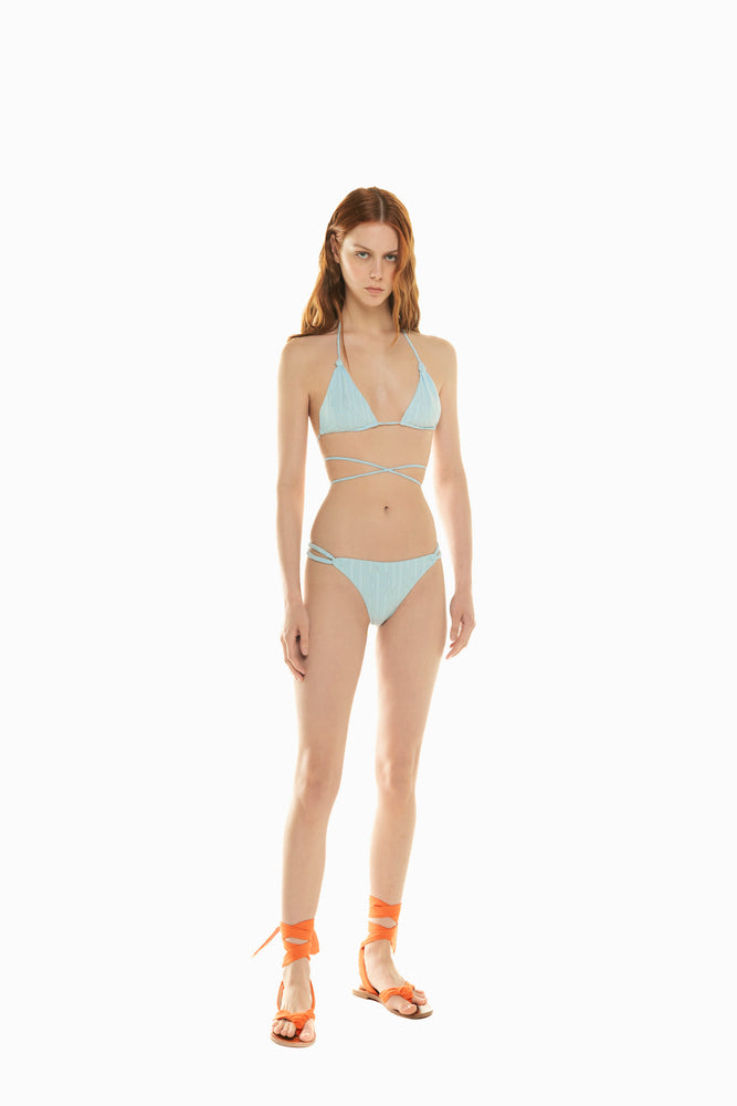 
                  
                    front of model wearing light blue bikini set Aria from 2024 Noodle Beachwear collection
                  
                