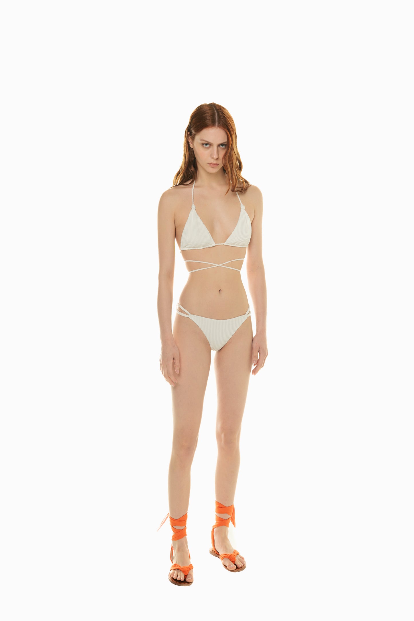 
                  
                    front of model wearing white bikini set Aria from 2024 Noodle Beachwear collection
                  
                