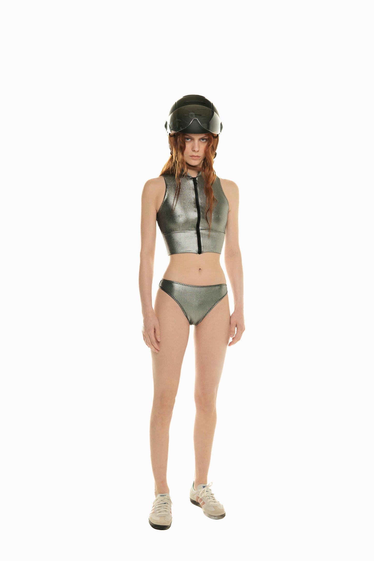 
                  
                    front of model wearing metallic ribbed bikini set Hari from 2024 Noodle Beachwear with helmet
                  
                