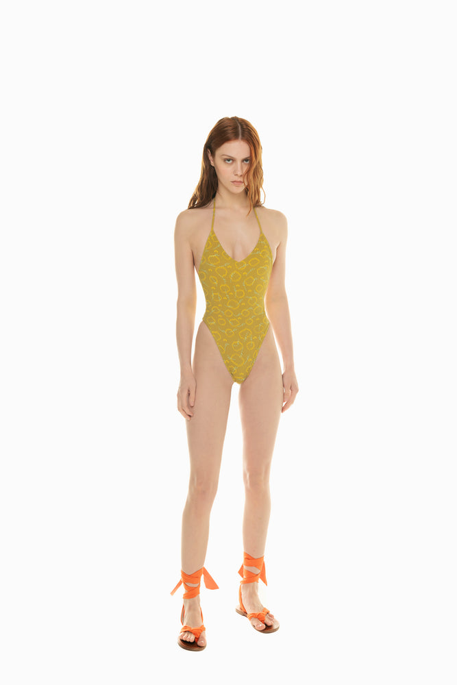 
                  
                    front of model wearing green yellow and light blue swimsuit Ellie with clouds from 2024 Noodle Beachwear
                  
                