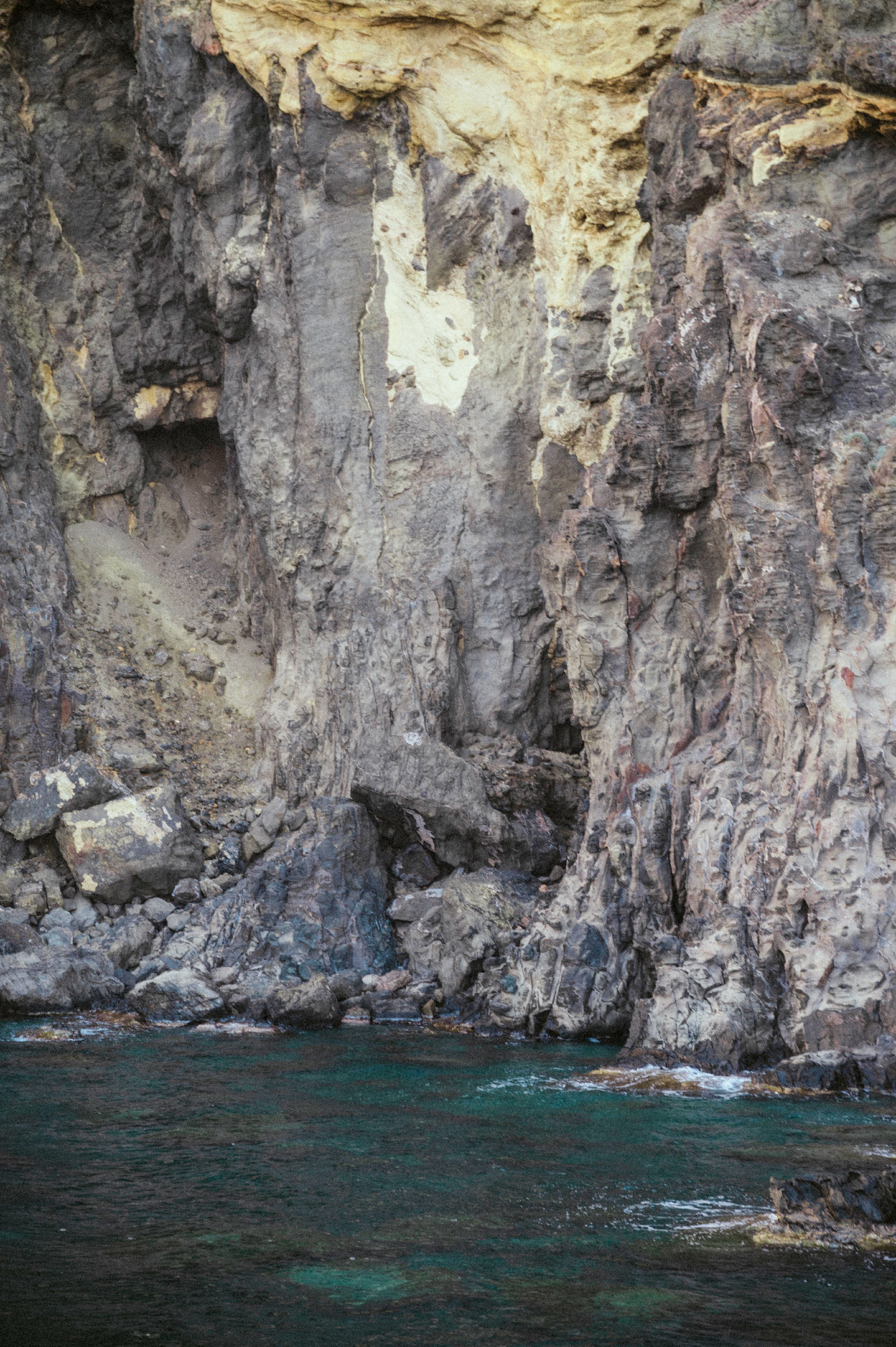 landscape of rocks and blue sea